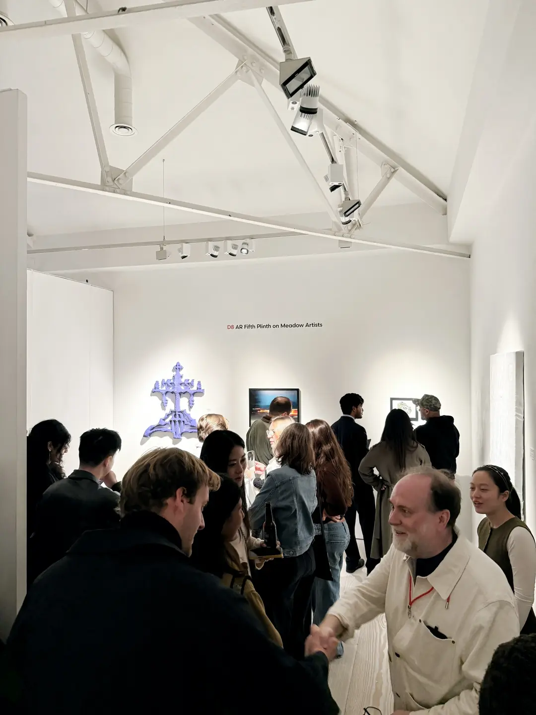 People interacting with AR artworks