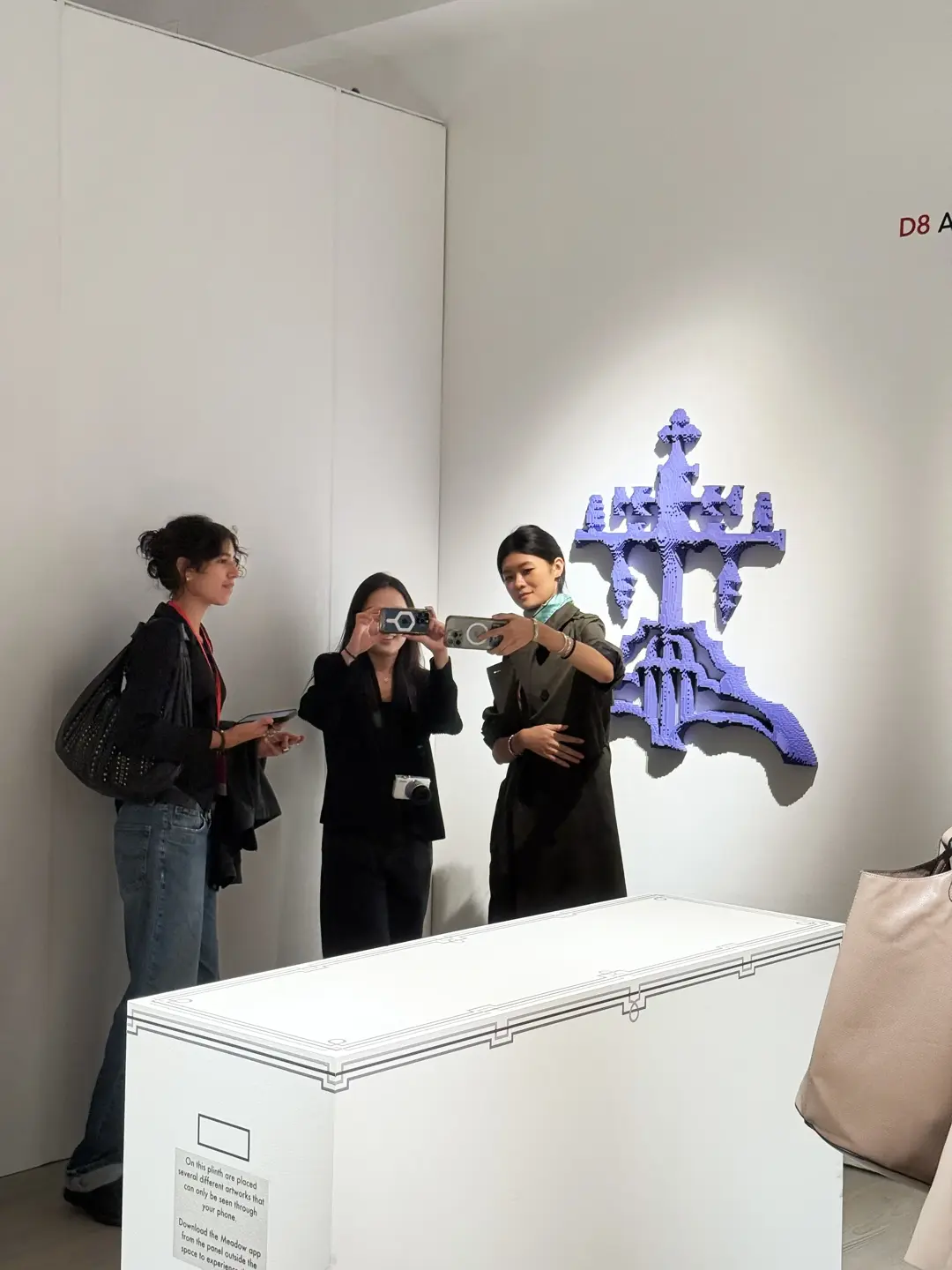 Visitors experiencing the exhibition